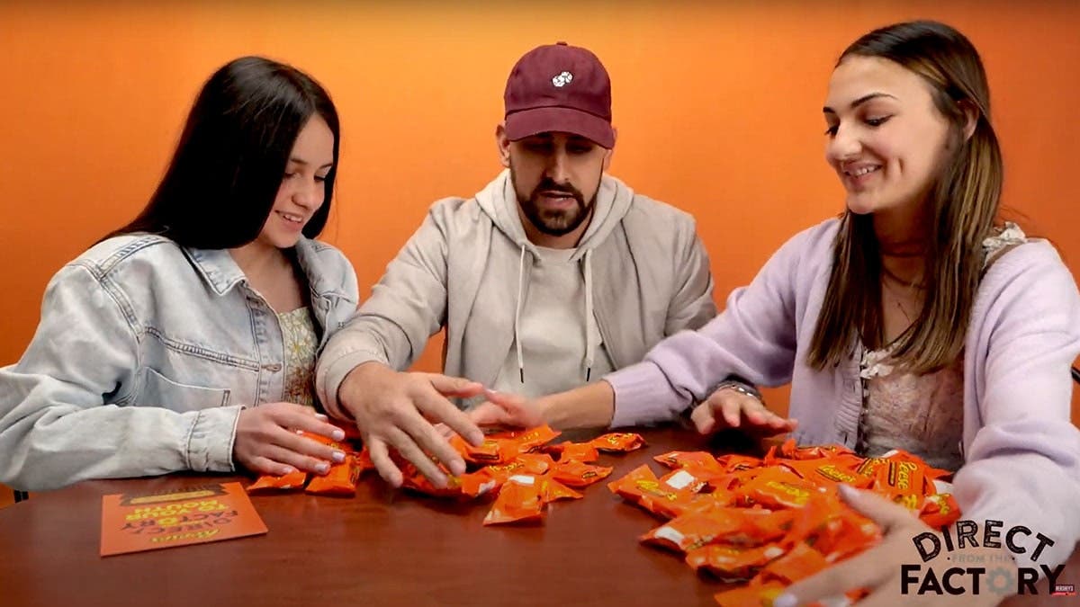 People tasting Reese's Cups Fresh From the Factory