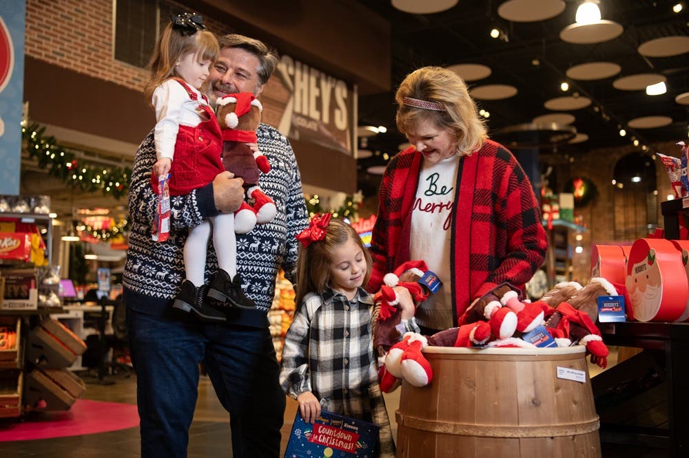 Family with Holiday Merch